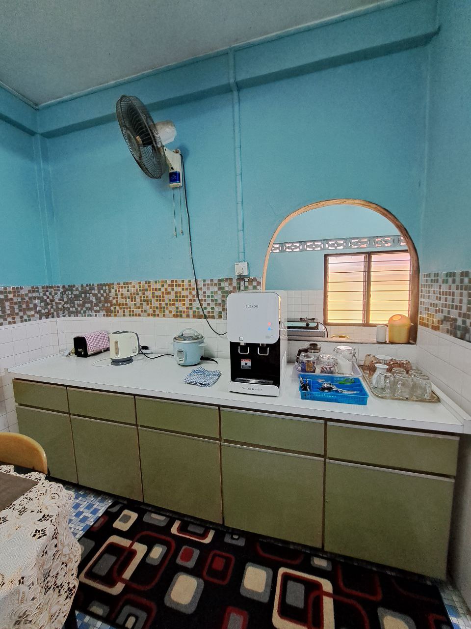 Kitchen and dining area with table, counter and appliances