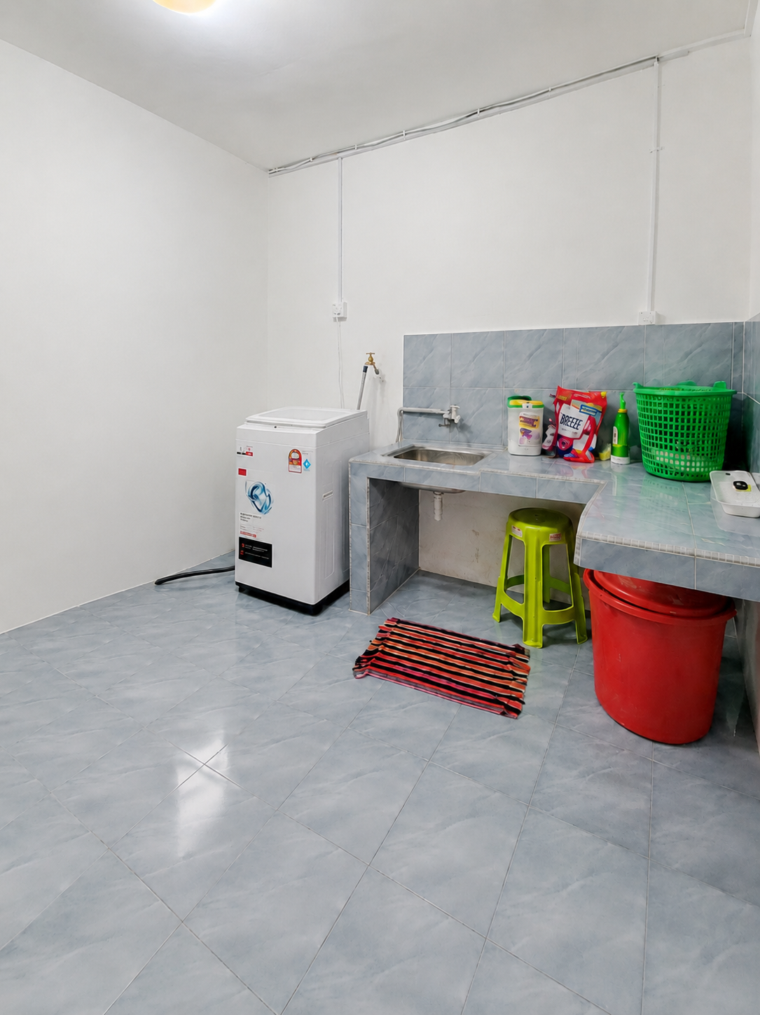 Washing machine, drying racks and cleaning supplies